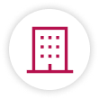 Red building icon on black and white background.