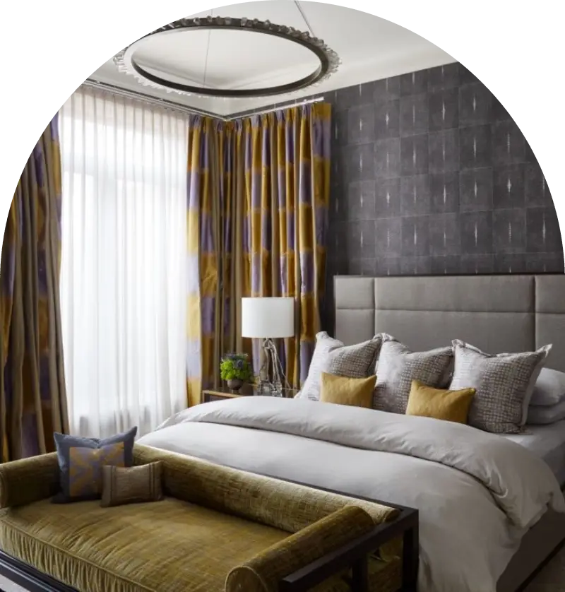 GettyImages-182902746-1.png (1) A bedroom with a bed, chair and window.